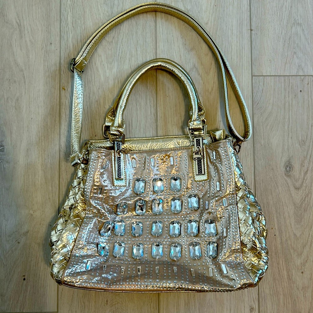 Bought at a Vegas boutique- gold w lots of bling
